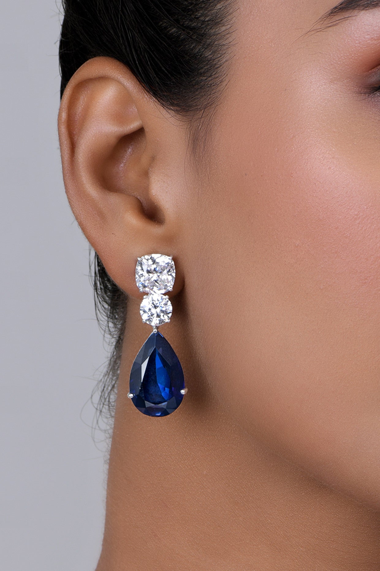Man Made Pear Cut Blue Sapphire and White Swarovski Zirconia Classic Earrings