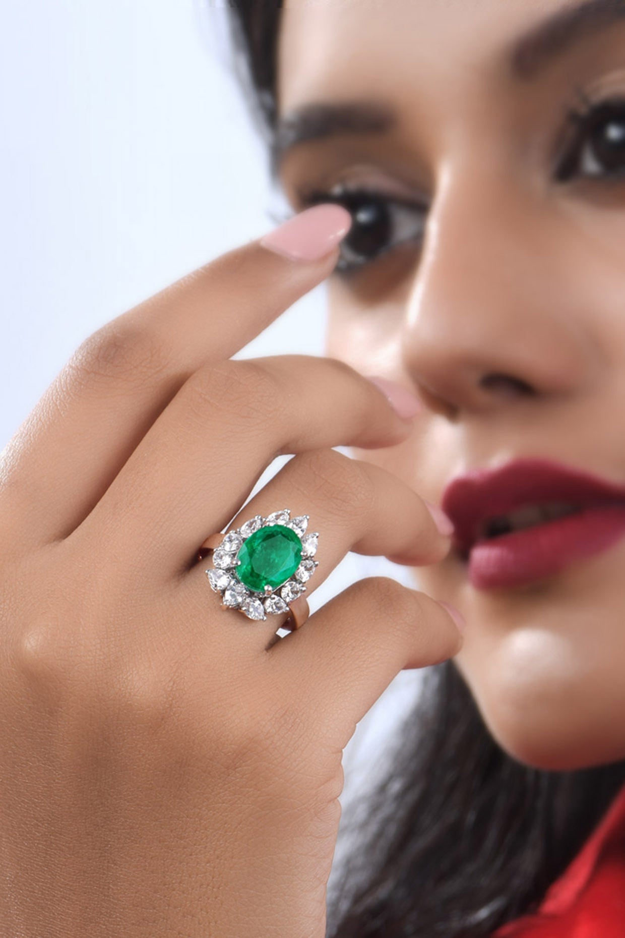 Man Made Oval Cut Emerald and Mix Shaped white Swarovski Zirconia Ring