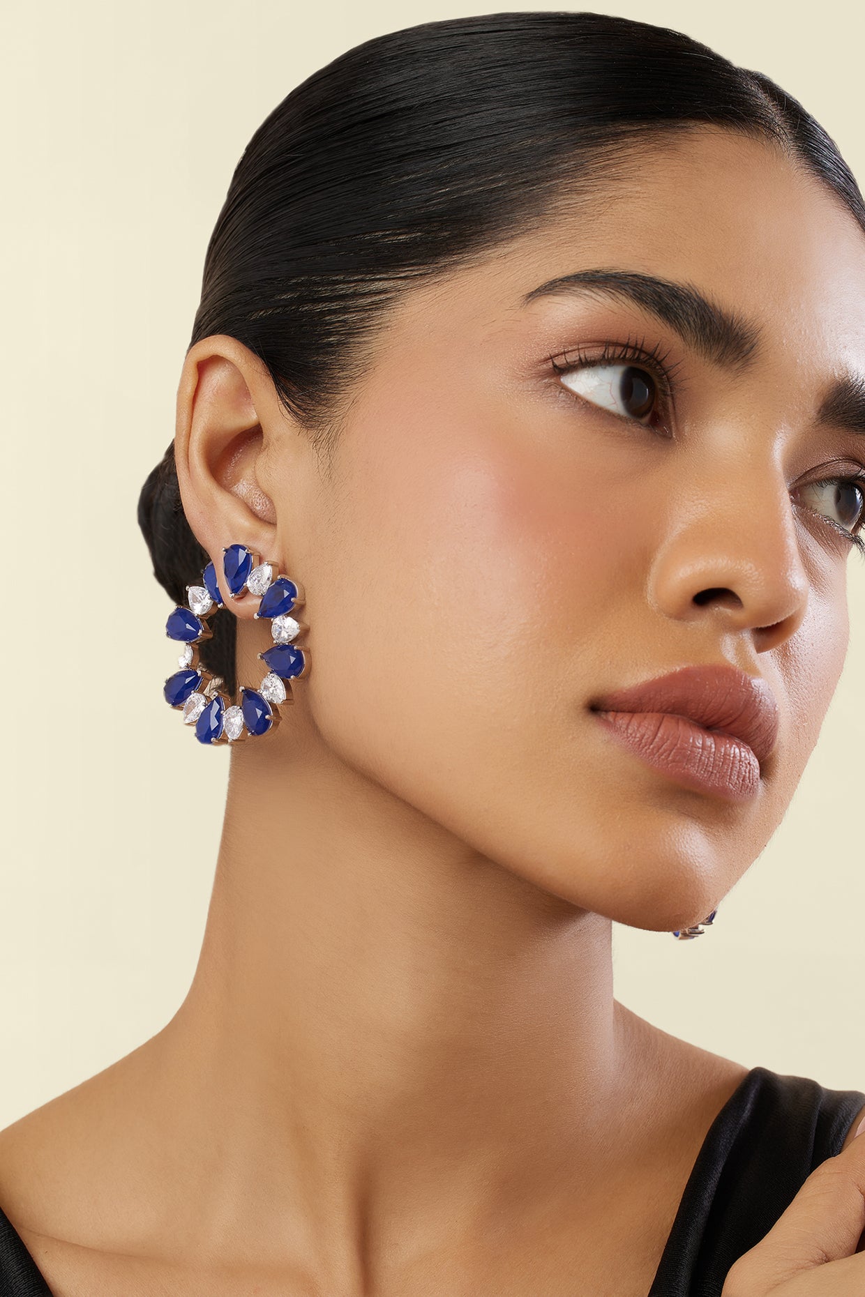 Sapphire Glow Circle Studs In Rhodium Plating