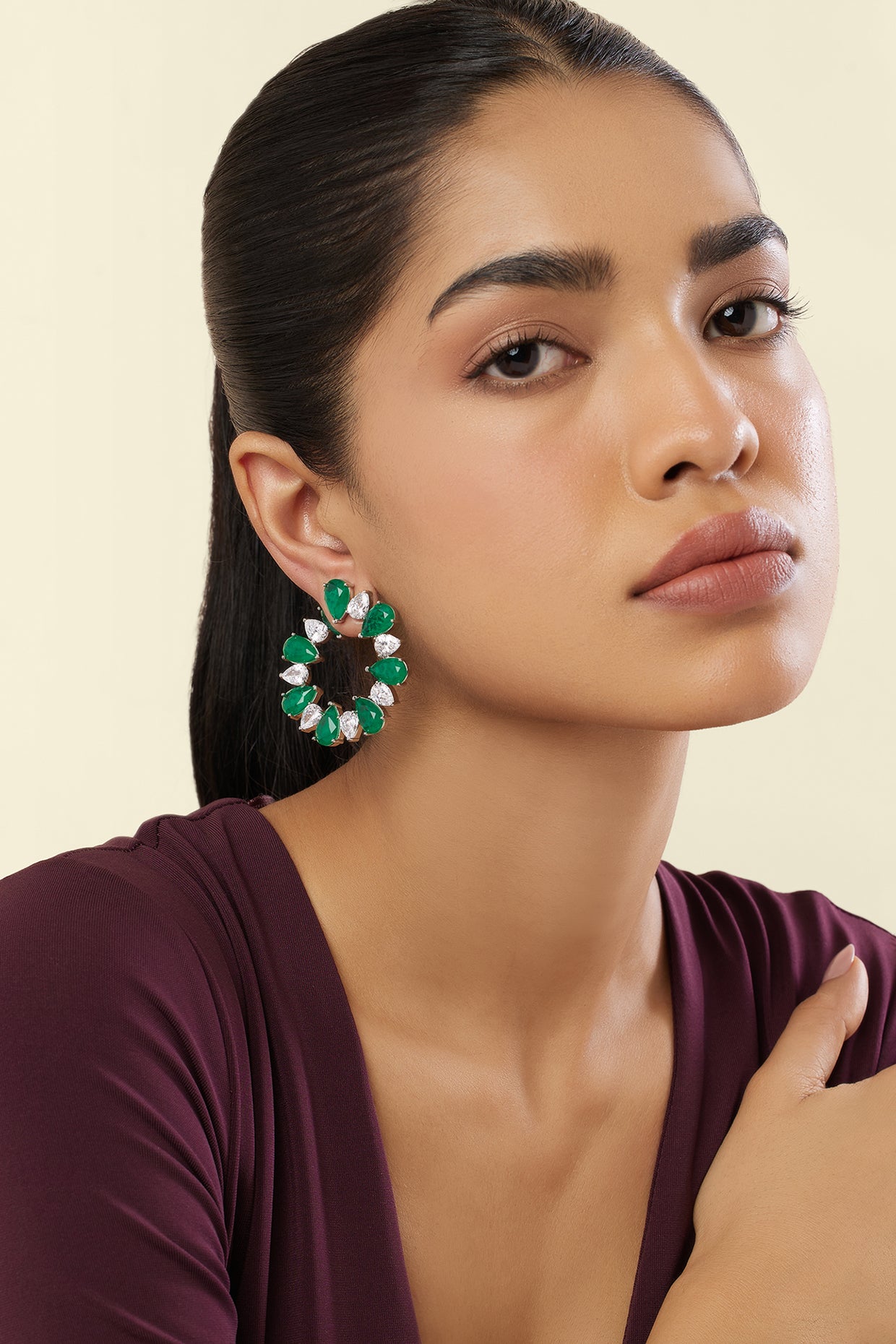 Emerald Glow Circle Studs In Rhodium Plating