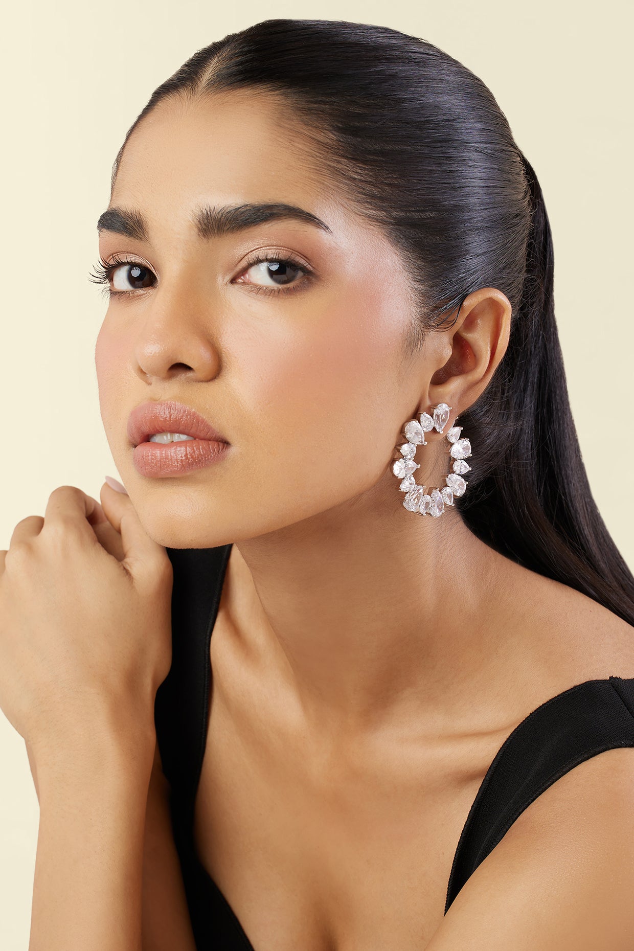 Eternal Glow Circle Studs In Rhodium Plating