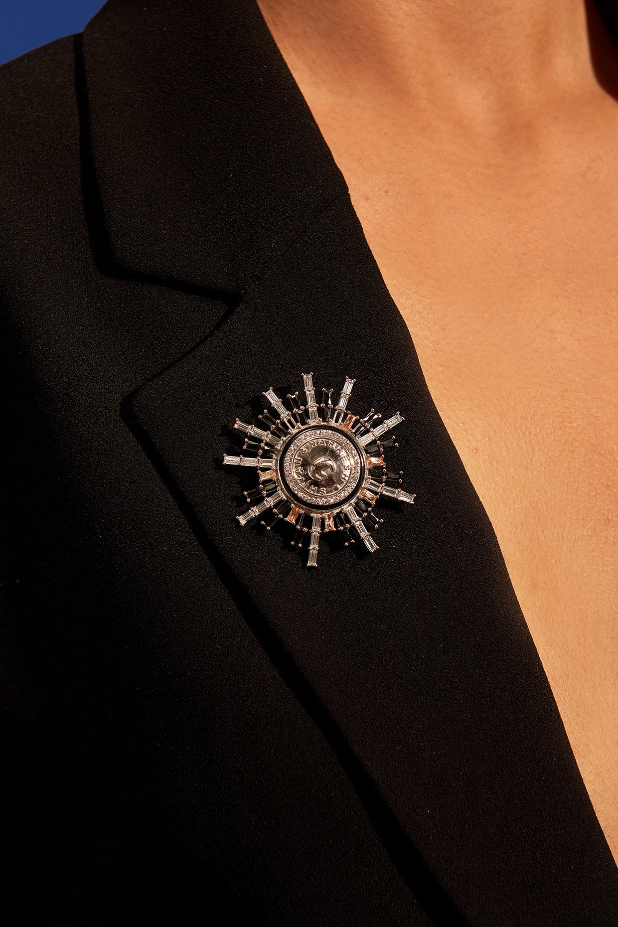 White Finish Numisma Star Burst Broch