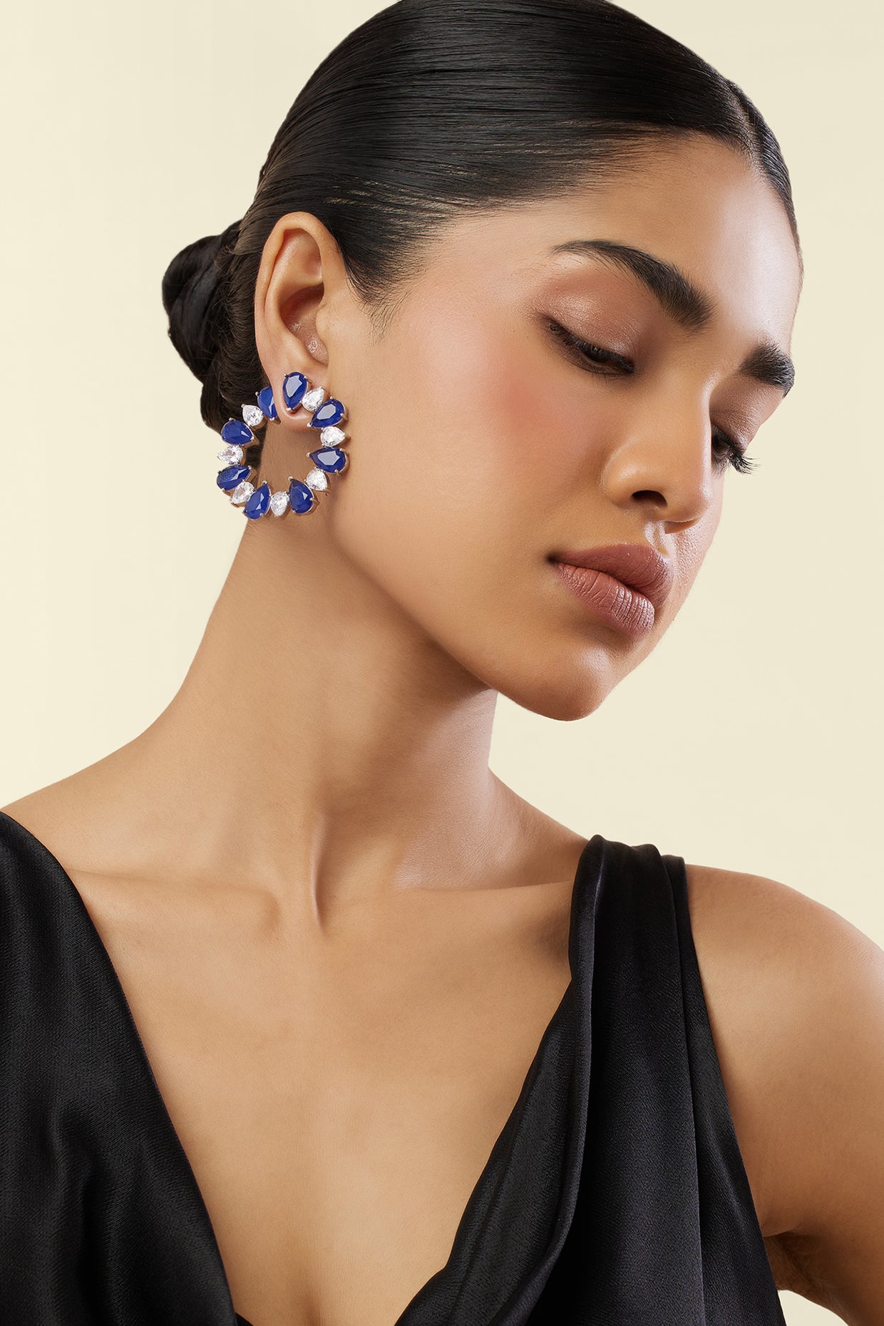 Sapphire Glow Circle Studs In Rhodium Plating