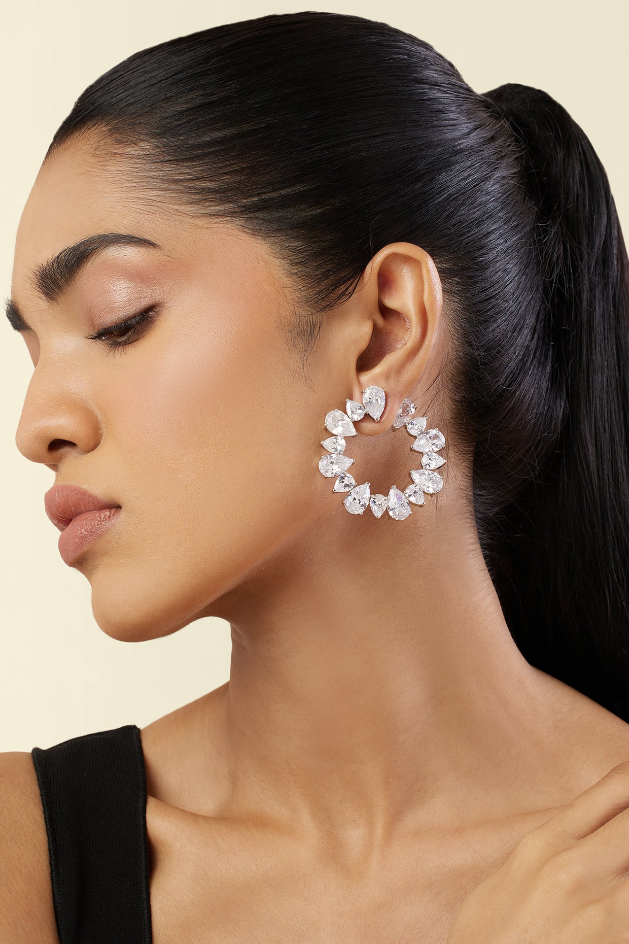 Eternal Glow Circle Studs In Rhodium Plating